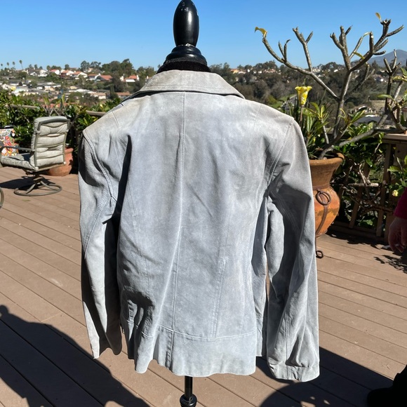 100 % Leather feels like suede. Pretty blue and lined. Needs to be dry cleaned. - Picture 2 of 6